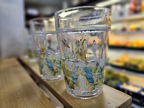 Image of plastic cup with Peter Rabbit printed on it.